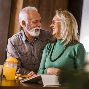 Older Couple Smiling at Each Other