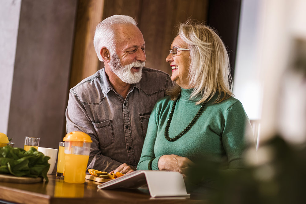 Older Couple Smiling at Each Other